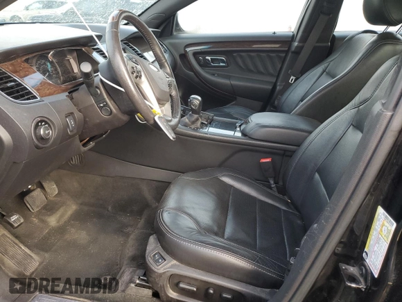 2017 Ford Taurus Limited with VIN 1FAHP2J88HG102721, listed as a Copart auction lot 77889724 with 108,224 mi miles and Salvage Title. Bid and sale history available at DreamBid. Image 7.