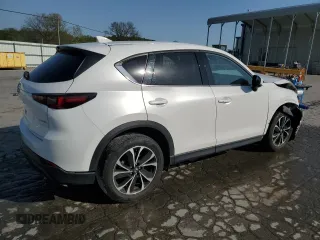 2023 Mazda CX-5 2.5 S Premium Package with VIN JM3KFBDM1P0187492, listed as a Copart auction lot 52923685 with 0 mi miles and Salvage Title. Bid and sale history available at carsss.com. Image 3.