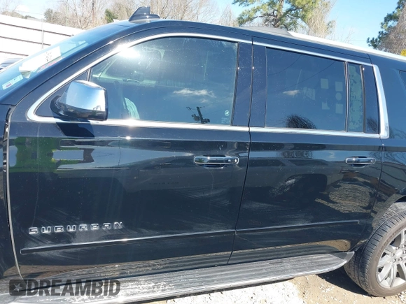 2019 Chevrolet Suburban LT with VIN 1GNSCJKC5KR360318, listed as a IAAI auction lot 41504344 with 82,997 mi miles and . Bid and sale history available at DreamBid. Image 14.