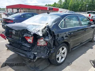 2013 Volkswagen Passat SE with VIN 1VWBP7A34DC114543, listed as a IAAI auction lot 42464549 with 111,146 mi miles and . Bid and sale history available at DreamBid. Image 4.