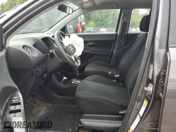 2009 Scion xD with VIN JTKKU10499J045881, listed as a Copart auction lot 60923855 with 125,762 mi miles and Salvage title. Bid and sale history available at DreamBid. Image 7.