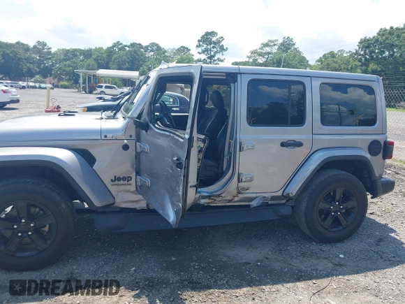 2021 Jeep Wrangler Unlimited Sahara with VIN 1C4HJXEN3MW628845, listed as a IAAI auction lot 42438049 with 49,970 mi miles and . Bid and sale history available at DreamBid. Image 14.
