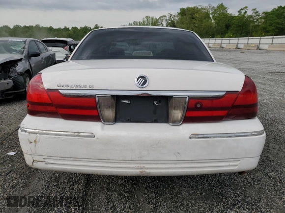 2003 Mercury Grand Marquis GS Convenience z VIN 2MEFM74WX3X633910, wystawiony jako Copart lot #52999865 z przebiegiem 207 970 mil mil oraz Szkoda całkowita • Salvage title. Historia ofert i sprzedaży dostępna na DreamBid. Obrazek 6.