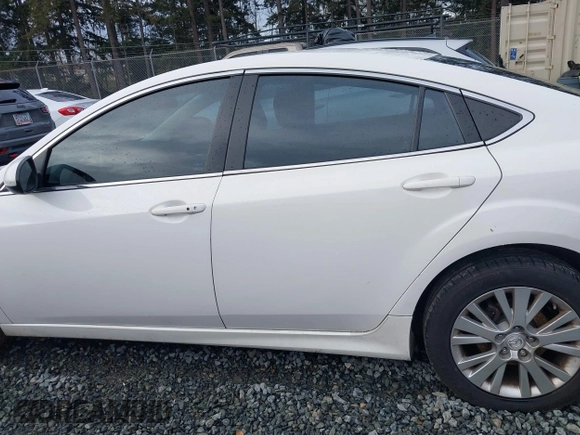 2009 Mazda 6 i Touring with VIN 1YVHP82A195M01537, listed as a IAAI auction lot 41471542 with 180,175 mi miles and . Bid and sale history available at carsss.com. Image 14.