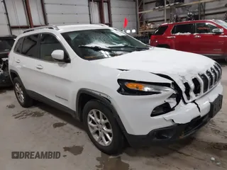 2015 Jeep Cherokee Latitude z VIN 1C4PJMCB4FW635406, wystawiony jako IAAI lot #41168412 z przebiegiem 131 089 mil mil oraz . Historia ofert i sprzedaży dostępna na DreamBid. Obrazek 1.