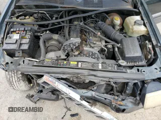 1995 Jeep Grand Cherokee Laredo with VIN 1J4FX58S8SC773884, listed as a Copart auction lot 56572555 with 424,126 mi miles and Salvage title. Bid and sale history available at DreamBid. Image 11.