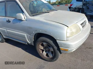 2000 Suzuki Grand Vitara z VIN JS3TE62V6Y4109305, wystawiony jako IAAI lot #41937744 z przebiegiem 255 231 mil mil oraz . Historia ofert i sprzedaży dostępna na DreamBid. Obrazek 6.