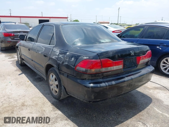 2002 Honda Accord EX z VIN 1HGCG56642A144814, wystawiony jako IAAI lot #42332217 z przebiegiem 250 835 mil mil oraz . Historia ofert i sprzedaży dostępna na DreamBid. Obrazek 3.