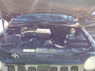 2003 Jeep Liberty Sport with VIN 1J4GK48K23W719610, listed as a IAAI auction lot 41998067 with 150,916 mi miles and . Bid and sale history available at DreamBid. Image 10.