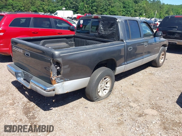2001 Dodge Dakota Sport z VIN 1B7HL2ANX1S297770, wystawiony jako IAAI lot #42309715 z przebiegiem 279 458 mil mil oraz . Historia ofert i sprzedaży dostępna na DreamBid. Obrazek 4.