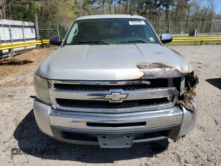 2010 Chevrolet Silverado 1500 LT with VIN 1GCSCSE03AZ298271, listed as a Copart auction lot 49427065 with 138,154 mi miles and Salvage Title. Bid and sale history available at DreamBid. Image 5.