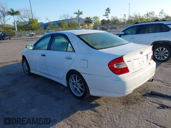 2003 Toyota Camry LE with VIN 4T1BE32KX3U196211, listed as a IAAI auction lot 41535512 with 184,473 mi miles and . Bid and sale history available at DreamBid. Image 3.
