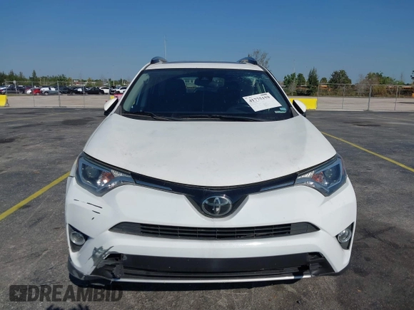 2018 Toyota RAV4 XLE with VIN JTMWFREV3JJ753454, listed as a IAAI auction lot 41775159 with 75,078 mi miles. Bid and sale history available at carsss.com. Image 12.