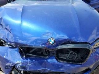 2022 BMW X4 M z VIN 5YM23EC05N9K69338, wystawiony jako Copart lot #63157463 z przebiegiem Nie podano mil oraz . Historia ofert i sprzedaży dostępna na DreamBid. Obrazek 11.