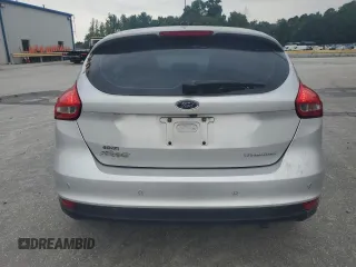 2017 Ford Focus Titanium with VIN 1FADP3N27HL251297, listed as a Copart auction lot 67373094 with 104,733 mi miles and Salvage Title. Bid and sale history available at carsss.com. Image 6.