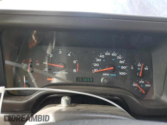 2002 Jeep Wrangler Sport z VIN 1J4FA49SX2P772609, wystawiony jako Copart lot #55893425 z przebiegiem 157 653 mil mil oraz Szkoda całkowita • Salvage title. Historia ofert i sprzedaży dostępna na DreamBid. Obrazek 9.