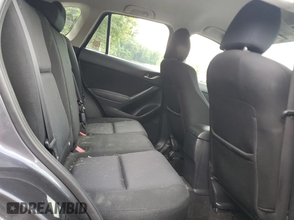 2015 Mazda CX-5 Sport with VIN JM3KE4BYXF0511249, listed as a Copart auction lot 63310695 with 208,615 mi miles and Salvage title. Bid and sale history available at DreamBid. Image 11.