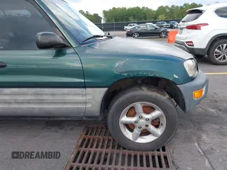 1999 Toyota RAV4 with VIN JT3GP10V4X7052720, listed as a IAAI auction lot 42490948 with 321,165 mi miles and . Bid and sale history available at DreamBid. Image 14.