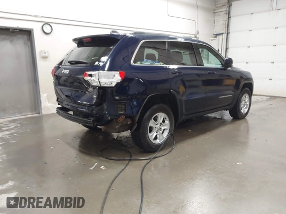 2016 Jeep Grand Cherokee Laredo with VIN 1C4RJFAG5GC434359, listed as a IAAI auction lot 42555310 with 128,350 mi miles and . Bid and sale history available at DreamBid. Image 4.