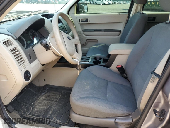 2008 Ford Escape XLS with VIN 1FMCU02Z18KE11979, listed as a Copart auction lot 60212165 with 239,177 mi miles and Salvage title. Bid and sale history available at DreamBid. Image 7.