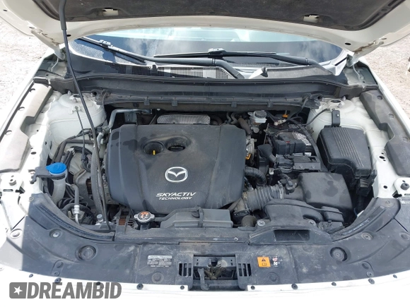 2019 Mazda CX-5 Touring with VIN JM3KFBCMXK0595905, listed as a IAAI auction lot 41934373 with 83,020 mi miles. Bid and sale history available at carsss.com. Image 10.