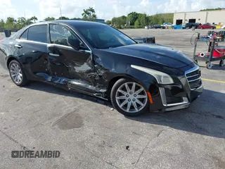 2015 Cadillac CTS RWD with VIN 1G6AP5SX8F0140364, listed as a IAAI auction lot 42535236 with 126,277 mi miles and . Bid and sale history available at DreamBid. Image 1.