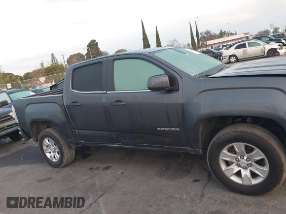 2016 GMC Canyon 2WD SLE with VIN 1GTG5CE30G1301490, listed as a IAAI auction lot 41409489 with 109,618 mi miles. Bid and sale history available at carsss.com. Image 13.