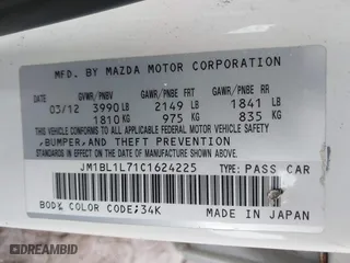 2012 Mazda Mazda3 i Touring with VIN JM1BL1L71C1624225, listed as a IAAI auction lot 41423890 with 199,251 mi miles. Bid and sale history available at carsss.com. Image 9.
