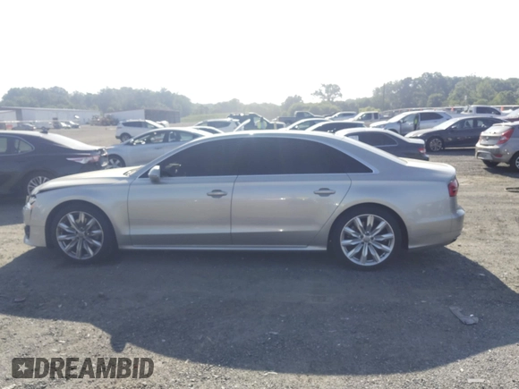 2017 Audi A8 with VIN WAU44AFD3HN014802, listed as a IAAI auction lot 42573537 with 121,096 mi miles and . Bid and sale history available at DreamBid. Image 14.