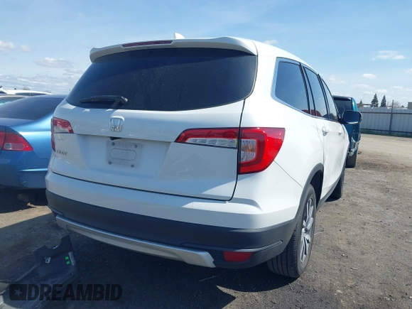 2020 Honda Pilot EX-L with VIN 5FNYF5H59LB027265, listed as a IAAI auction lot 41826300 with 57,201 mi miles. Bid and sale history available at carsss.com. Image 4.