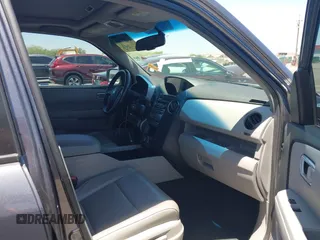 2014 Honda Pilot Touring z VIN 5FNYF4H90EB033259, wystawiony jako IAAI lot #42287774 z przebiegiem 115 416 mil mil oraz . Historia ofert i sprzedaży dostępna na DreamBid. Obrazek 5.
