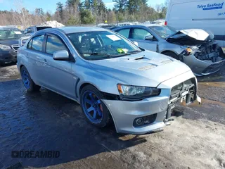 2008 Mitsubishi Lancer Evolution GSR with VIN JA3AW86V78U048263, listed as a IAAI auction lot 41670970 with 146,293 mi miles. Bid and sale history available at carsss.com. Image 1.