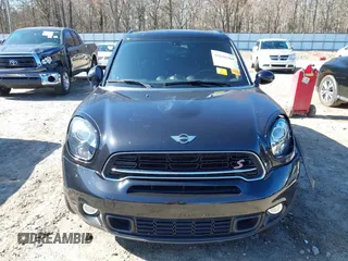2015 MINI Countryman S with VIN WMWZC3C5XFWT04916, listed as a IAAI auction lot 41636369 with 101,448 mi miles and . Bid and sale history available at DreamBid. Image 12.