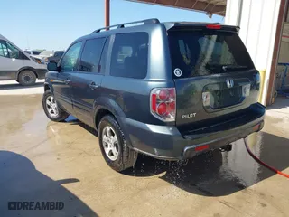 2006 Honda Pilot EX-L with VIN 5FNYF28556B003516, listed as a IAAI auction lot 42013495 with 207,443 mi miles. Bid and sale history available at carsss.com. Image 3.