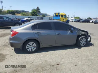 2012 Honda Civic LX z VIN 2HGFB2F59CH603985, wystawiony jako Copart lot #55675435 z przebiegiem 125 567 mil mil oraz Szkoda całkowita • Salvage title. Historia ofert i sprzedaży dostępna na DreamBid. Obrazek 3.