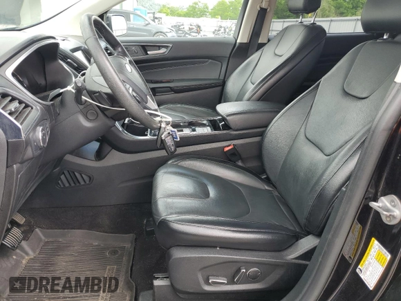 2019 Ford Edge Titanium with VIN 2FMPK4K94KBB35538, listed as a Copart auction lot 57770545 with 85,021 mi miles and Salvage title. Bid and sale history available at DreamBid. Image 7.