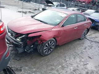 2016 Nissan Altima 2.5 S with VIN 1N4AL3AP6GC218323, listed as a IAAI auction lot 41418397 with 33,928 mi miles. Bid and sale history available at carsss.com. Image 18.