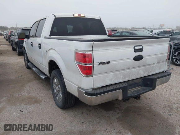 2012 Ford F-150 XL with VIN 1FTFW1CT0CFA15412, listed as a IAAI auction lot 41693392 with 340,759 mi miles. Bid and sale history available at carsss.com. Image 3.