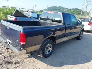 1999 Ford F-150 XL with VIN 1FTRX17L3XNB16928, listed as a IAAI auction lot 42739602 with 118,577 mi miles and . Bid and sale history available at DreamBid. Image 4.