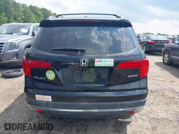 2017 Honda Pilot Touring with VIN 5FNYF5H99HB037126, listed as a IAAI auction lot 42275048 with 164,289 mi miles and . Bid and sale history available at DreamBid. Image 16.