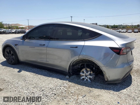 2024 Tesla Model Y Long Range with VIN 7SAYGDEE0RA288420, listed as a Copart auction lot 59159015 with 7,831 mi miles and Salvage title. Bid and sale history available at DreamBid. Image 2.