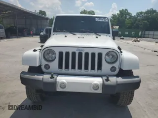 2016 Jeep Wrangler Unlimited Sahara with VIN 1C4BJWEG6GL182794, listed as a Copart auction lot 57880725 with 127,752 mi miles and Salvage title. Bid and sale history available at DreamBid. Image 5.