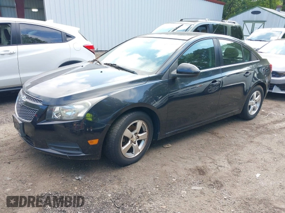 2014 Chevrolet Cruze 1LT with VIN 1G1PC5SB8E7210158, listed as a IAAI auction lot 42729599 with 106,400 mi miles and . Bid and sale history available at DreamBid. Image 2.