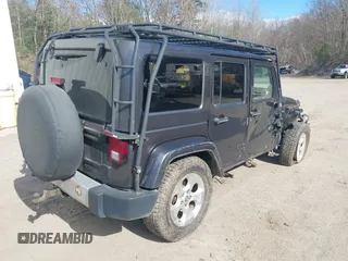 2014 Jeep Wrangler Unlimited Sahara с VIN 1C4BJWEG3EL267279, выставлен на аукционе IAAI как лот 42083836 с пробегом 81 796 миль миль и . История ставок и продаж доступна на DreamBid. Изображение 4.