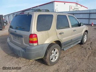 2007 Ford Escape XLT with VIN 1FMYU03187KB17315, listed as a IAAI auction lot 41864785 with 199,225 mi miles. Bid and sale history available at carsss.com. Image 4.