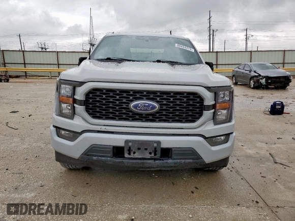 2023 Ford F-150 XL with VIN 1FTEW1CP8PKD11810, listed as a Copart auction lot 60453315 with 83,312 mi miles and Salvage title. Bid and sale history available at DreamBid. Image 5.