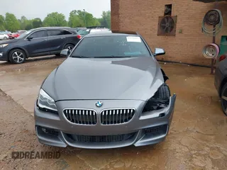2016 BMW 6 Series 640i xDrive with VIN WBA6D2C58GGT66160, listed as a IAAI auction lot 41130666 with 102,064 mi miles and . Bid and sale history available at carsss.com. Image 13.