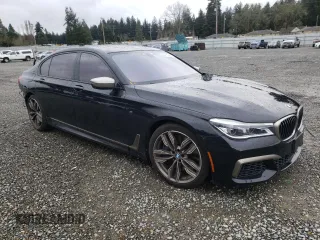 2018 BMW 7 Series M760i xDrive with VIN WBA7H6C55JG614811, listed as a Copart auction lot 44707433 with 27,542 mi miles. Bid and sale history available at carsss.com. Image 4.