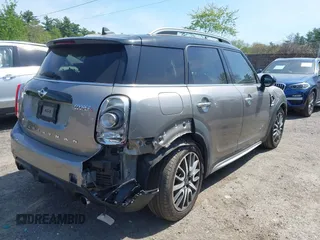 2017 MINI Countryman Cooper S z VIN WMZYT5C33H3D79148, wystawiony jako IAAI lot #42225781 z przebiegiem 95 023 mil mil oraz . Historia ofert i sprzedaży dostępna na DreamBid. Obrazek 4.