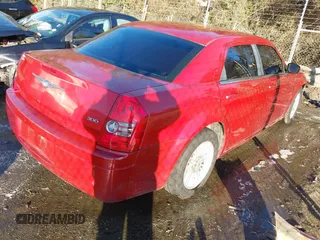 2009 Chrysler 300 LX with VIN 2C3KA43D69H565894, listed as a IAAI auction lot 41283079 with 233,098 mi miles. Bid and sale history available at carsss.com. Image 4.
